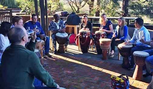 Village Rhythms team drumming performance